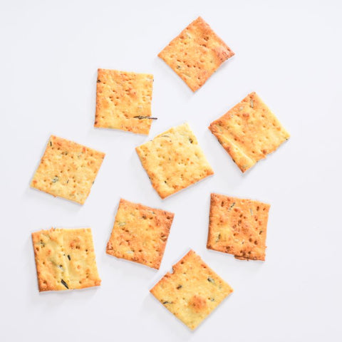 Baked Pita Crackers infused with rosemary and cheddar